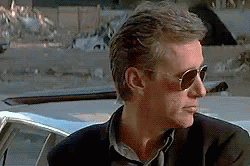 Man in Sunglasses Next to Car