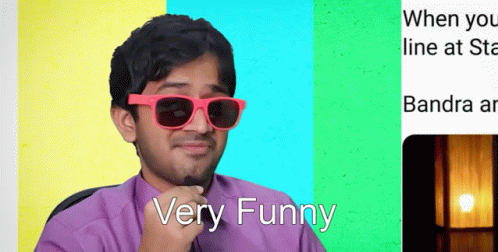 Man in Sunglasses Purple Shirt Says Very Funny