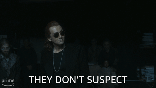 Man in Sunglasses Saying A Thing