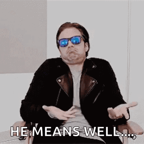Man in Sunglasses Saying He Means Well