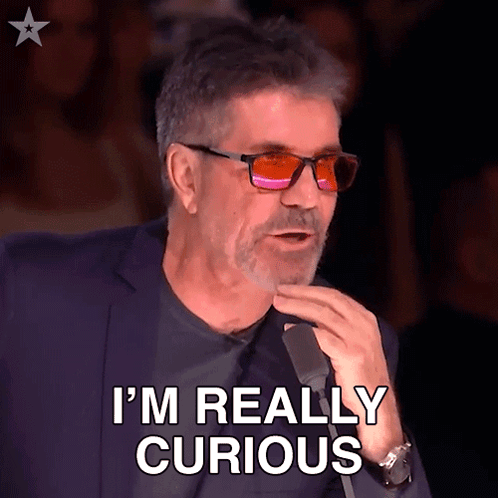 Man In Sunglasses Saying I'm Really Curious GIF