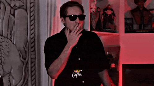 Man in Sunglasses Smoking Cigarette Shirt Says Caliban