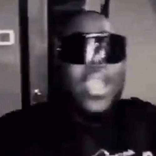 Man in Sunglasses Smoking Cigarette
