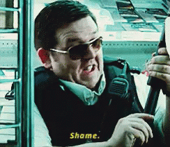 Man In Sunglasses Vest Holding Gun Saying Shame GIF