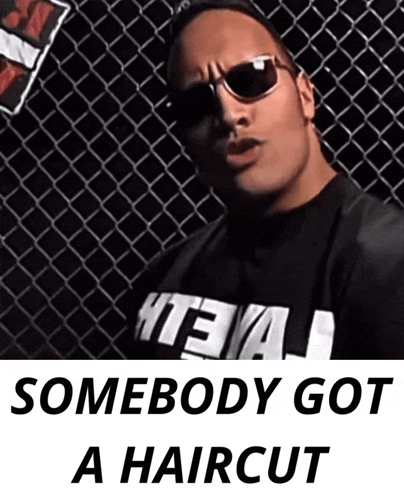 Man In Sunglasses Wearing Somebody Got A Haircut Shirt GIF