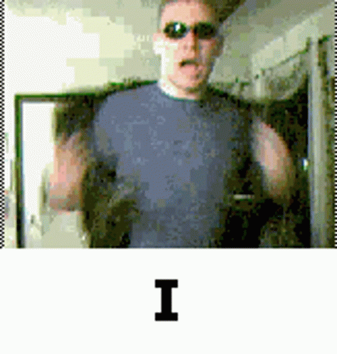 Man In Sunglasses With Letter I On Shirt GIF