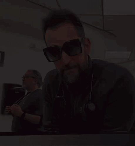 Man In Sunglasses With Stethoscope Saying NC GIF
