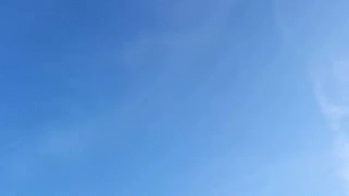 Man in Superdry Hat and Sunglasses