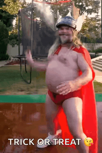 Man In Superhero Costume Dancing Trick Or Treat GIF