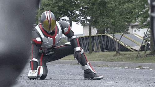 Man In Superhero Costume Kneeling GIF