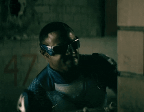 Man in Superhero Costume with 47