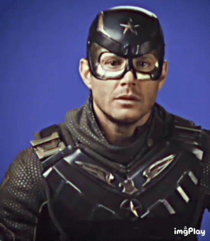 Man in Superhero Costume with Star Helmet