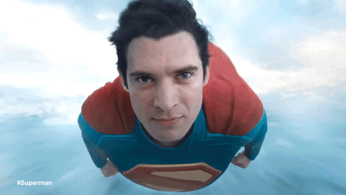 Man in Superman Costume Flying