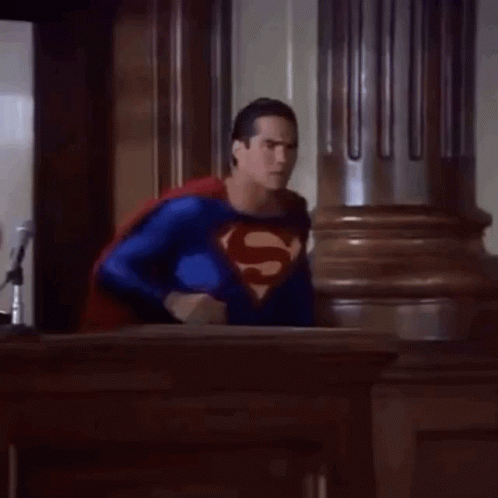 Man in Superman Costume in Courtroom
