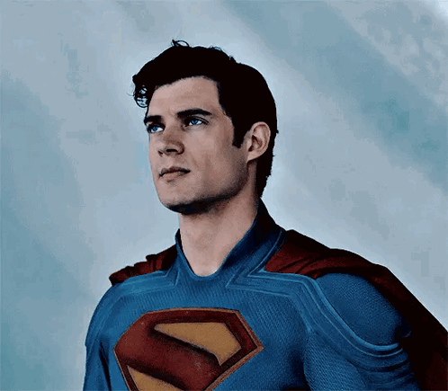 Man in Superman Costume Looking Up