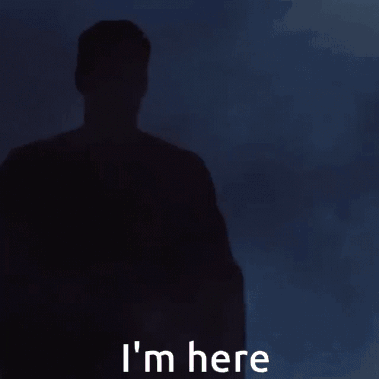 Man in Superman Costume Saying I'm Here