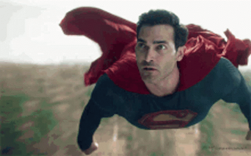 Man in Superman Suit Flying