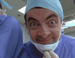 Man in Surgical Mask and Gloves Making Face