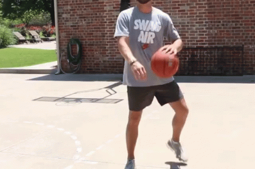 Man In Swan Air Shirt Dribbling Basketball GIF