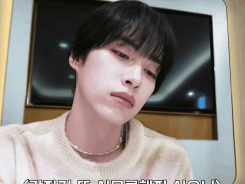 Man In Sweater And Pearl Necklace GIF