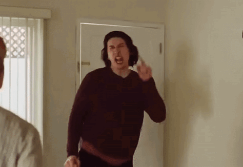 Man In Sweater Giving Middle Finger GIF