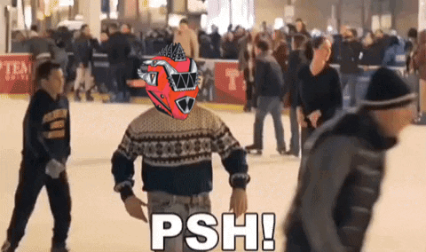 Man in Sweater on Ice Rink Saying Psh