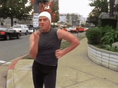 Man in Swim Cap Jogging