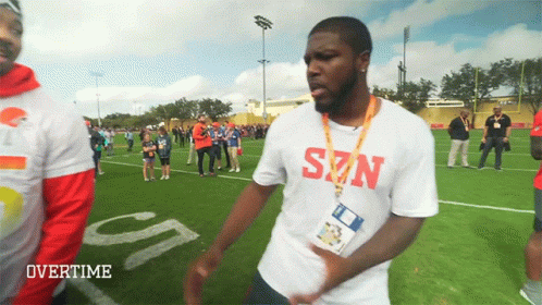 Man in Szn Shirt on Field