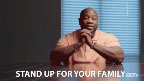 Man In Table Stand Up For Your Family GIF