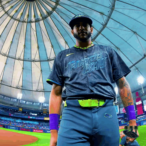 Man in Tampa Bay Jersey in Front of Dome