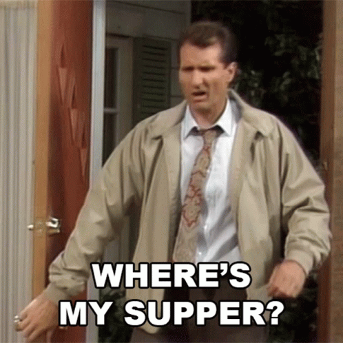 Man In Tan Jacket And Tie Asking Where's My Supper GIF