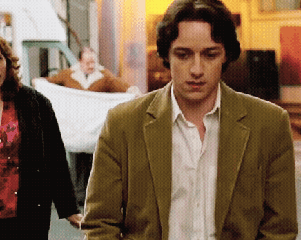 Man In Tan Jacket Walking GIF