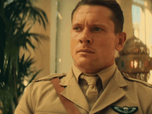 Man in Tan Uniform with Paratrooper Patch