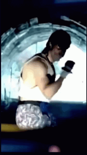 Man in Tank Top and Shorts Boxing