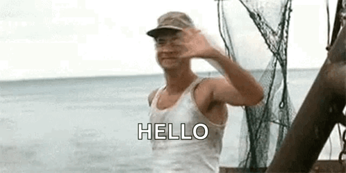 Man in Tank Top Hat Waving on Boat