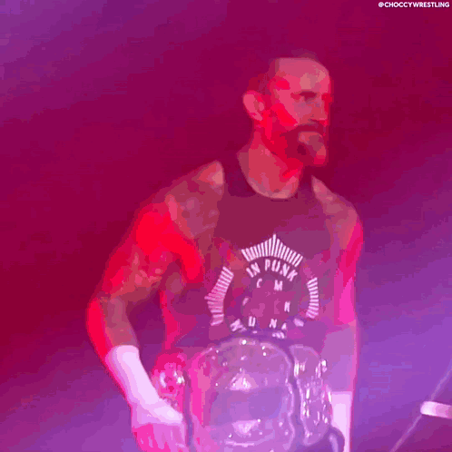 Man in Tank Top Holding Trophy