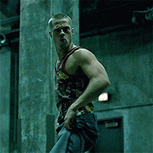 Man In Tank Top Saying I'm A Fighter GIF