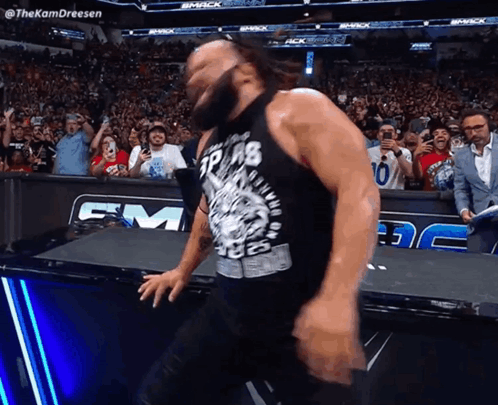 Man in Tank Top Saying TP AB