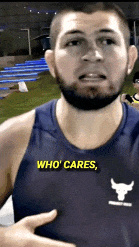 Man In Tank Top Saying Who Cares GIF