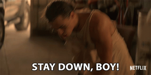 Man in Tank Top Says Stay Down Boy Netflix