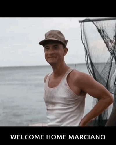 Man in Tank Top Standing Ocean Welcome Home Marciano