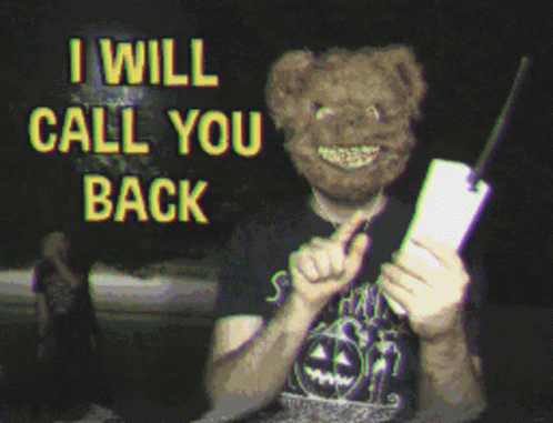 Man in Teddy Bear Mask and Samhain Shirt Holding Knife