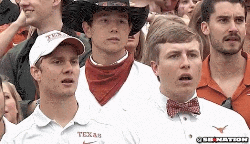 Man in Texas Shirt in Crowd