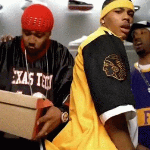 Man In Texas Tech Shirt Holding Cardboard Box GIF