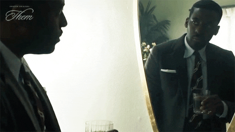Man In The Mirror Drinking From Glass GIF