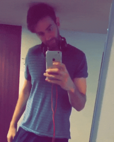 Man In The Mirror Taking Video GIF