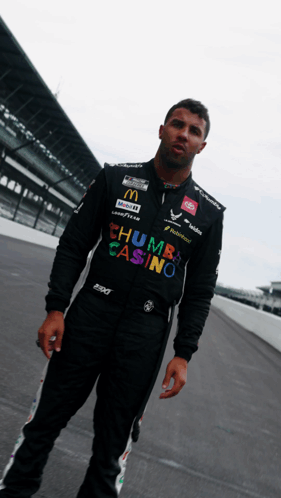 Man in Thumbs Casino Uniform on Track