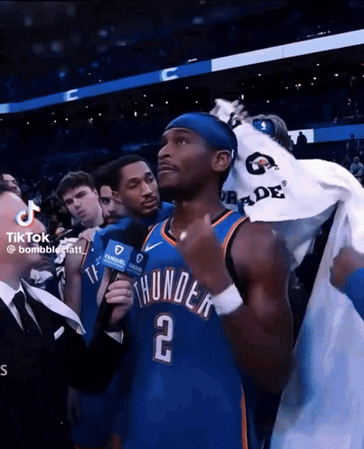 Man In Thunder Jersey Being Interviewed GIF