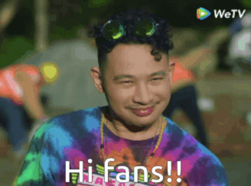 Man In Tie Dye Shirt Says Hi Fans GIF