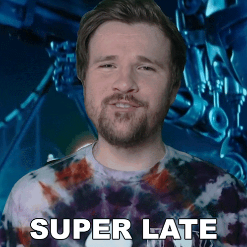 Man in Tie Dye Shirt Says Super Late to Robot